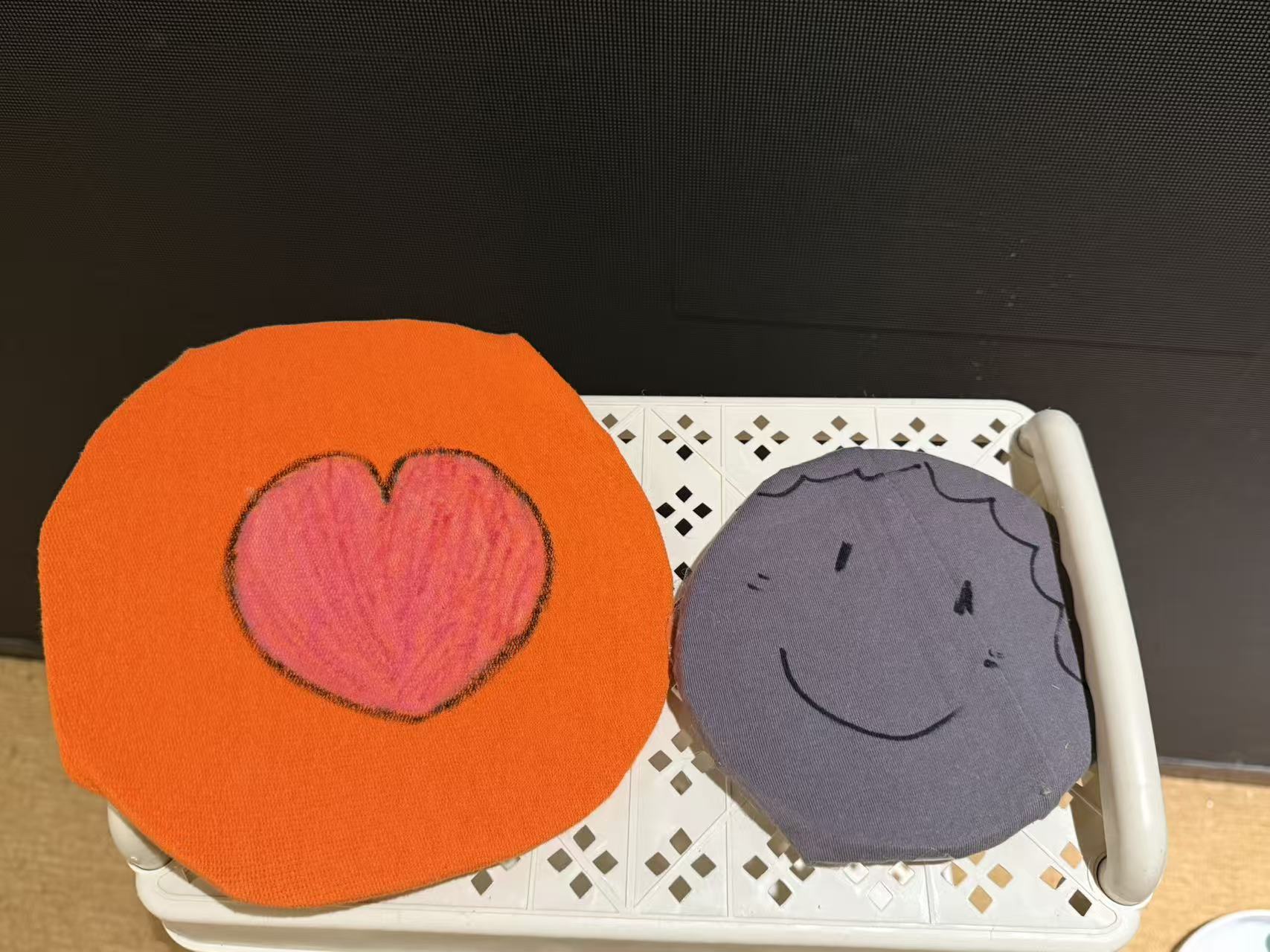 Another view of the fabric-covered cardboard play discs.
