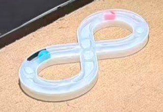 Actual figure-eight track assembled from unused toy sections.
